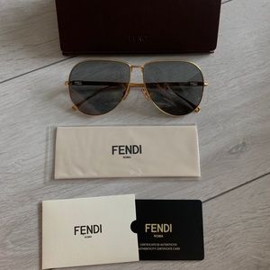 BNIB Fendi sunglass 350 + tax from BEyond the rack. They are too big for my Face